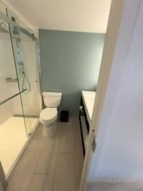 Queen Room with Two Queen Beds and Pool View bathroom picture #1
