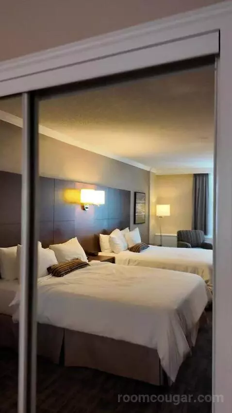 Queen Room with Two Queen Beds (#405) bed picture #11