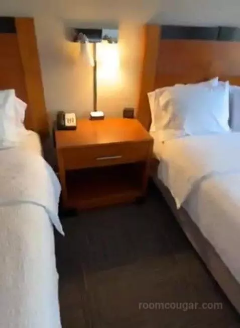 Queen Room with Two Queen Beds (#227) bed picture #6