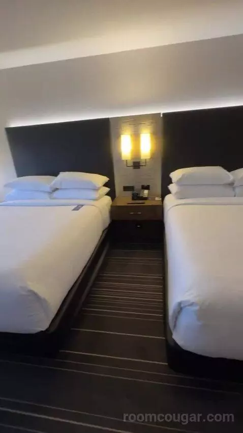 Queen Room with Two Queen Beds and City View bed picture #3