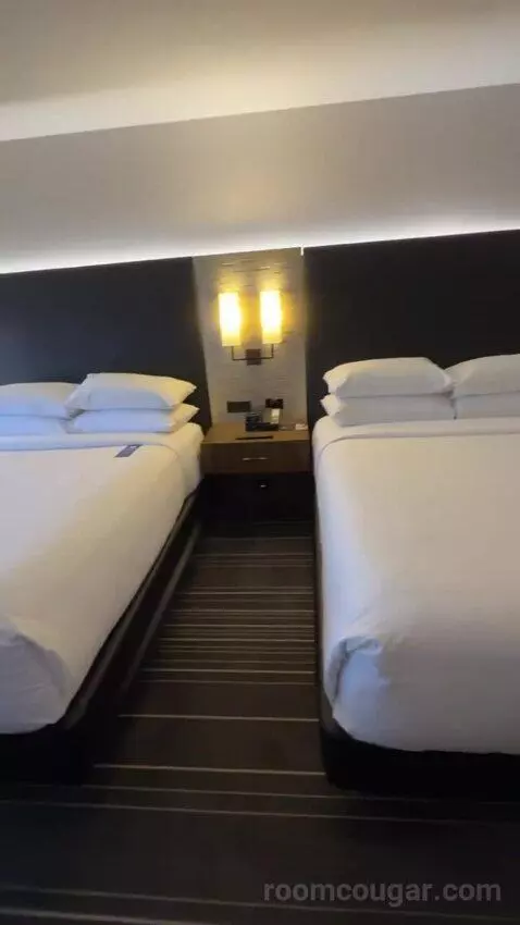 Queen Room with Two Queen Beds and City View bed picture #4