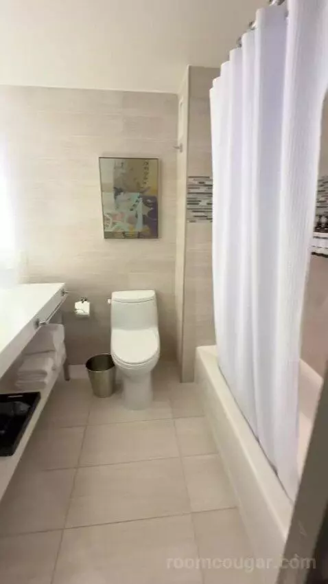 Queen Room with Two Queen Beds and City View bathroom picture #2