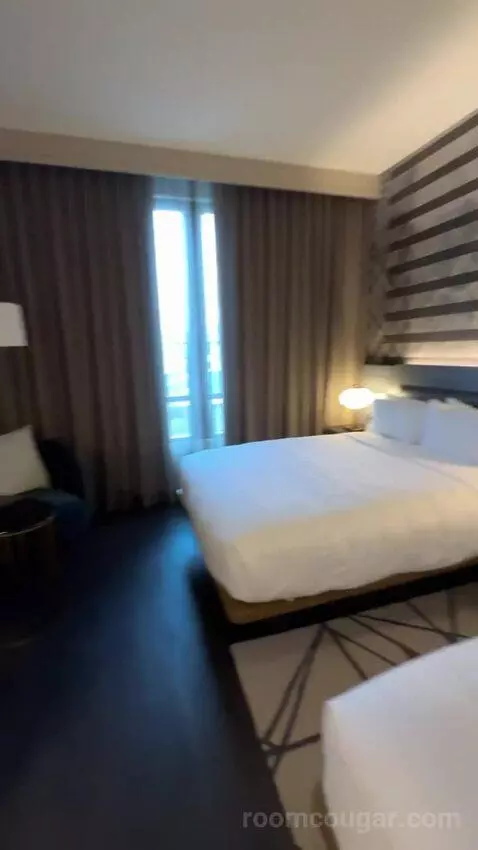 Standard Guest Room with 2 Queen, City View bed picture #9