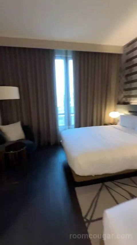 Standard Guest Room with 2 Queen, City View bed picture #10