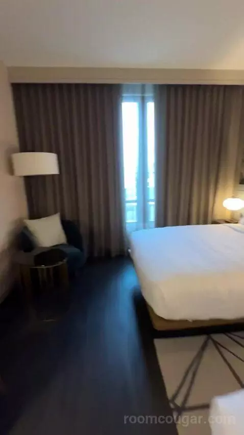 Standard Guest Room with 2 Queen, City View bed picture #11