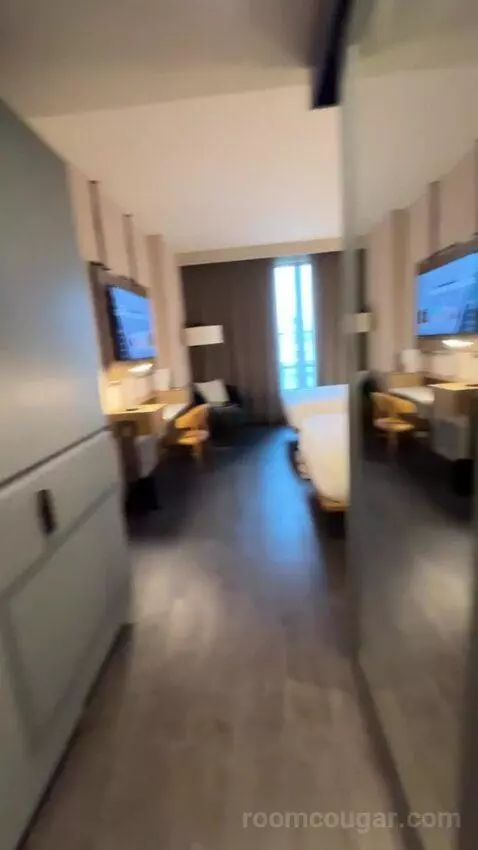 Standard Guest Room with 2 Queen, City View bed picture #2