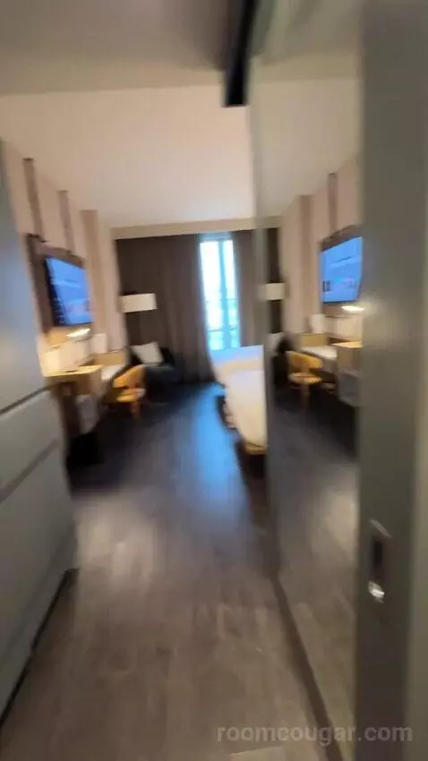 Standard Guest Room with 2 Queen, City View bed picture #3