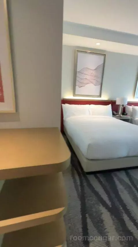 Premium Queen Room with Two Queen Beds and City View bed picture #1
