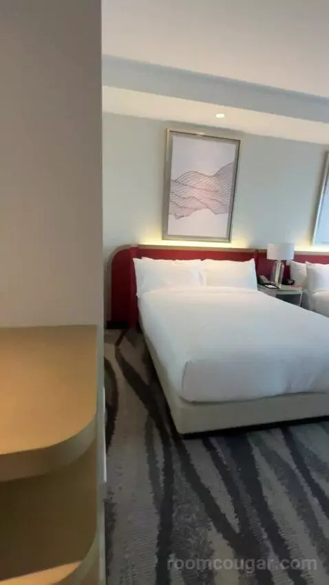 Premium Queen Room with Two Queen Beds and City View bed picture #4