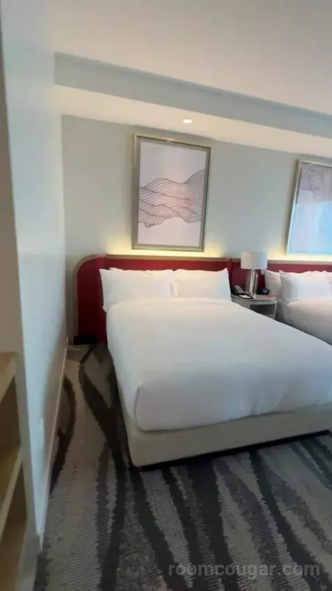 Premium Queen Room with Two Queen Beds and City View bed picture #8