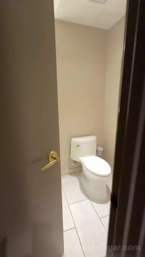 Deluxe Queen Room with Two Queen Beds and Partial Strip View bathroom picture #1