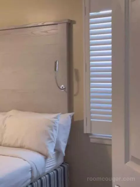 Two-Bedroom Villa with One King and Two Queen Beds with Sofa Bed and Garden View bed picture #3
