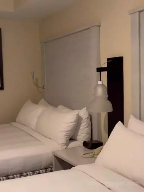 Two-Bedroom Villa with One King and Two Queen Beds with Sofa Bed and Garden View bed picture #7