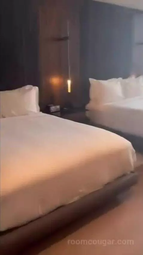 Deluxe Guest Room with 2 Queen, City View bed picture #1