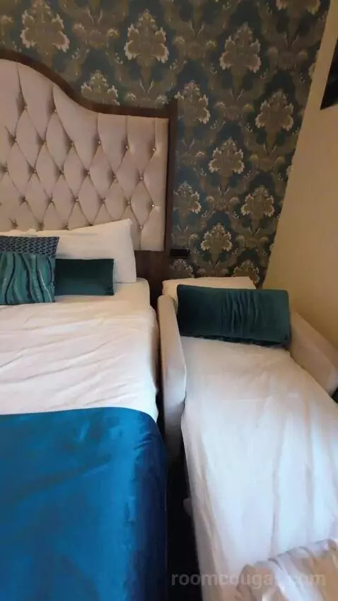 Comfort Triple Room (#305) bed picture #6