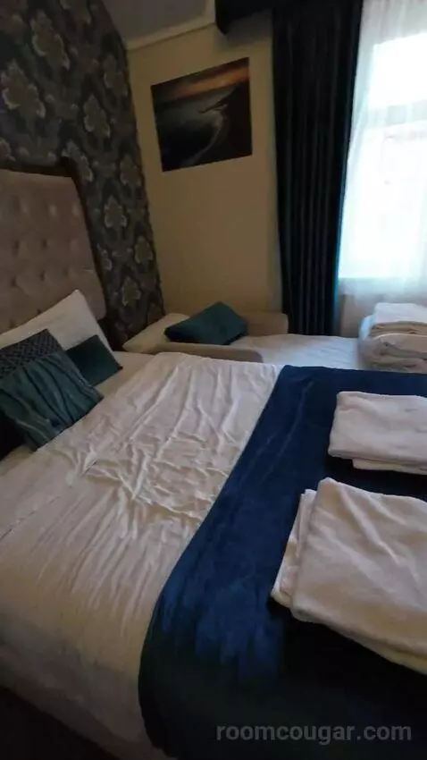Comfort Triple Room (#305) bed picture #10