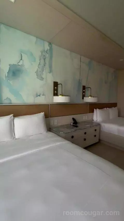 Queen Room with Two Queen Beds and Pool View (#662) bed picture #12