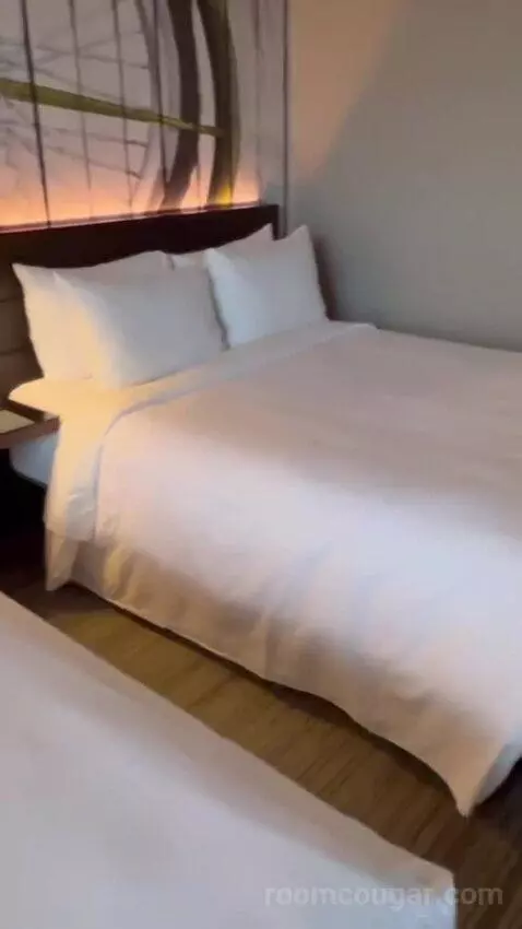Guest Room with Two Queen Beds and City View bed picture #9