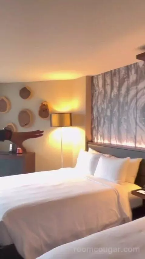 Guest Room with Two Queen Beds and City View bed picture #1