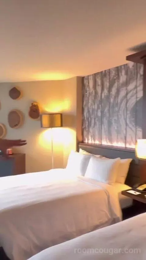 Guest Room with Two Queen Beds and City View bed picture #2
