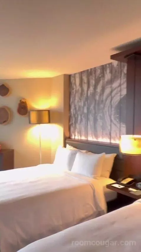 Guest Room with Two Queen Beds and City View bed picture #3