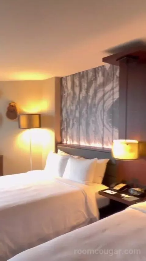 Guest Room with Two Queen Beds and City View bed picture #4