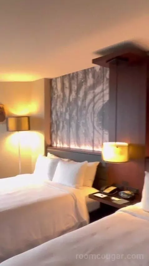 Guest Room with Two Queen Beds and City View bed picture #5
