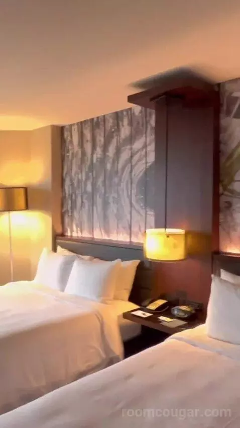 Guest Room with Two Queen Beds and City View bed picture #6
