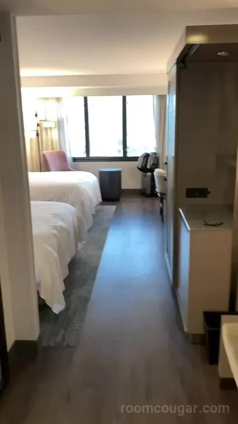 Larger Guest Room, 2 Queen, City View, Corner Room bed picture #1