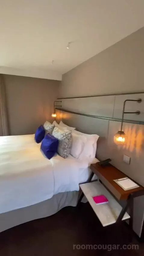 One-Bedroom King Suite with City View (#2500) bed picture #7