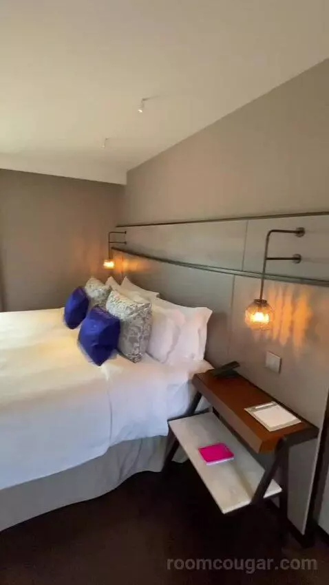 One-Bedroom King Suite with City View (#2500) bed picture #8