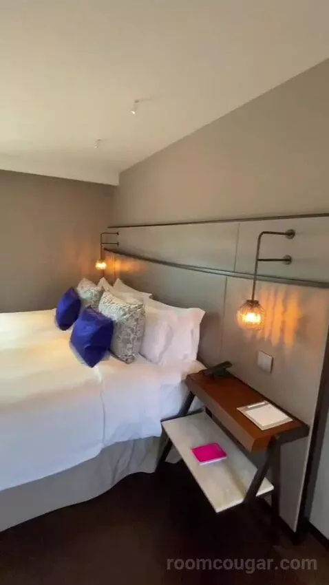 One-Bedroom King Suite with City View (#2500) bed picture #9