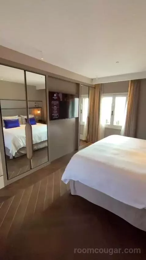 One-Bedroom King Suite with City View (#2500) bed picture #5