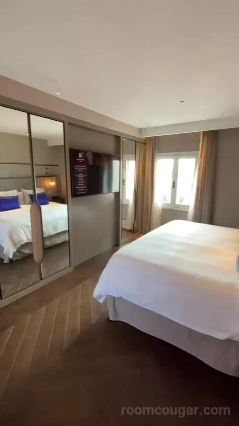 One-Bedroom King Suite with City View (#2500) bed picture #6