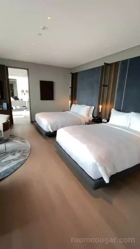 Deluxe Corner Queen Room with Two Queen Beds and City View (#4225) bed picture #9