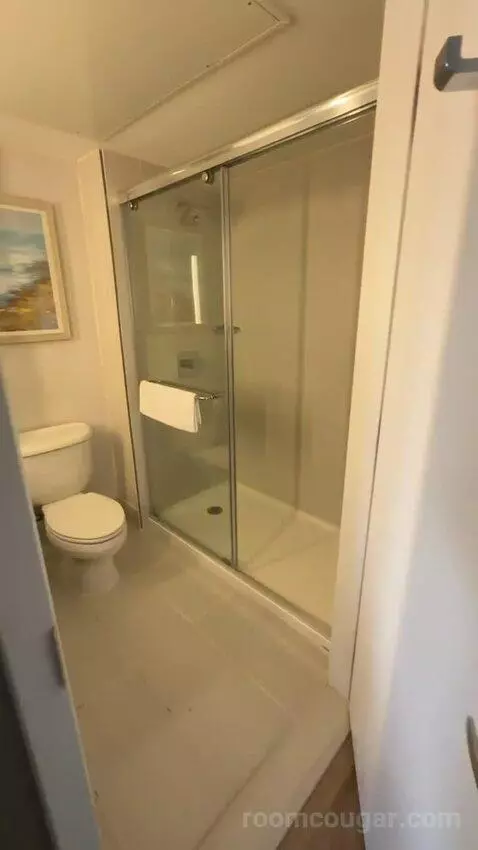 Queen Room with Two Queen Beds and Ocean View (#202) bathroom picture #2