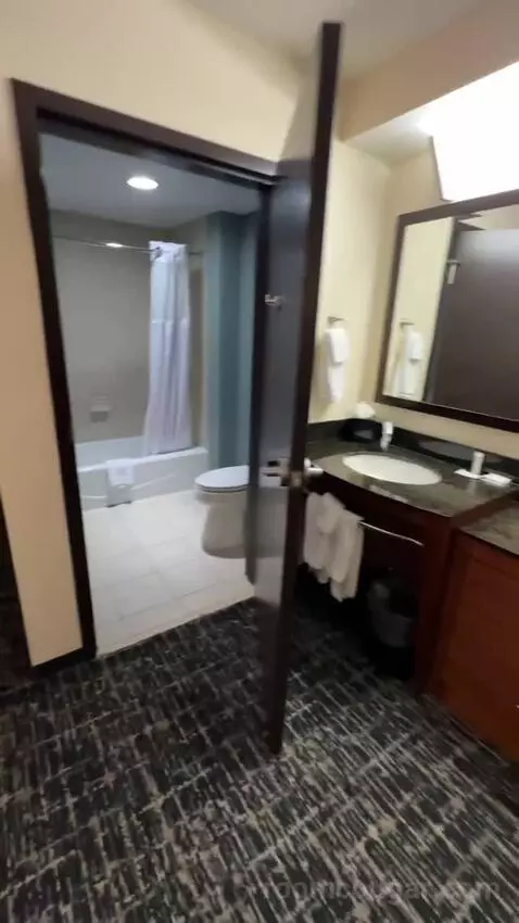 Queen Room with Two Queen Beds and Sofa Bed (#129) bathroom picture #1
