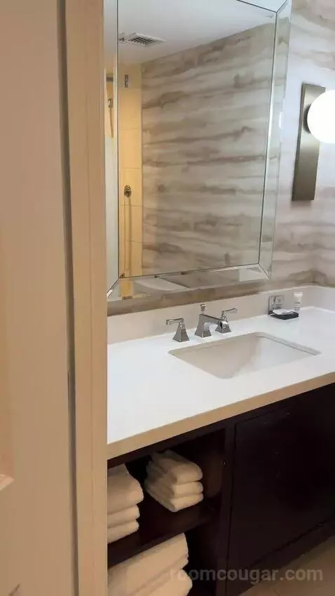 2 Double Beds, City View, Corner, Junior Suite (#710) bathroom picture #1