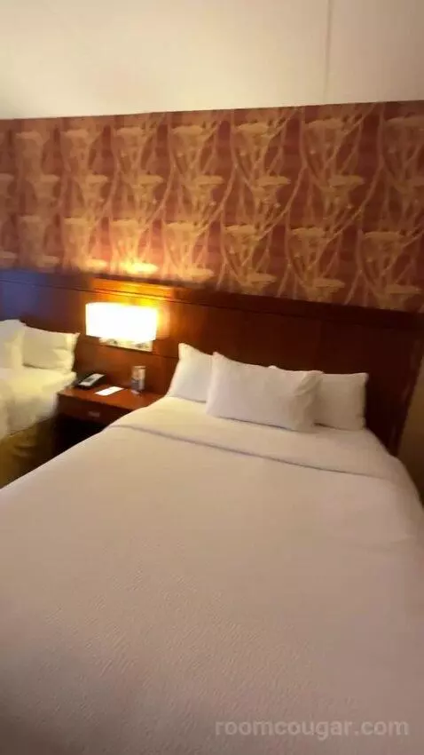 Queen Room with Two Queen Beds - City View (#568) bed picture #5