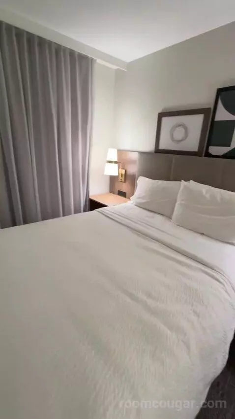 2 Double, 1 Queen, 2 Bedroom Suite (#302) bed picture #1