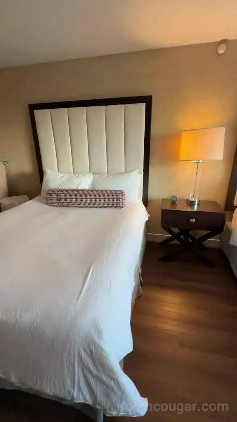 Premium Queen Room with Two Queen Beds and Village View (#804) bed picture #9