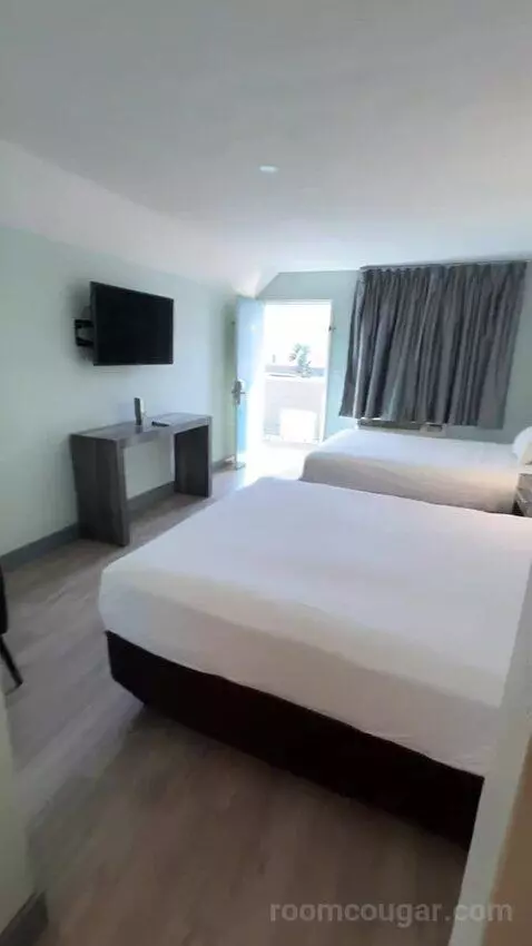 Queen Room with Two Queen Beds (#310) bed picture #8