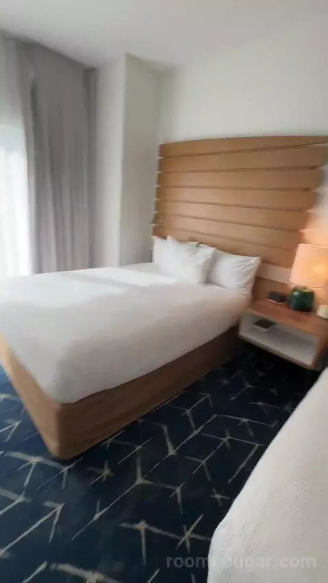 Queen Studio with Balcony (#309) bed picture #9