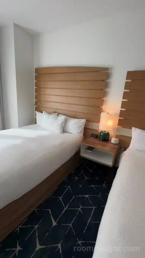 Queen Studio with Balcony (#309) bed picture #11