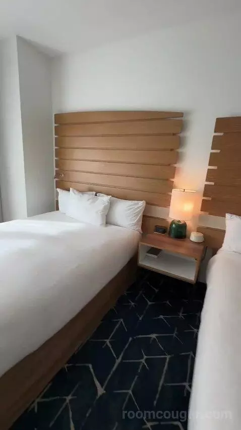 Queen Studio with Balcony (#309) bed picture #12