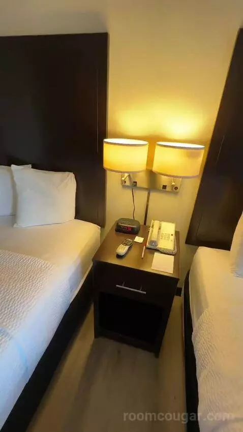 Queen Room with Two Queen Beds (#113) bed picture #11