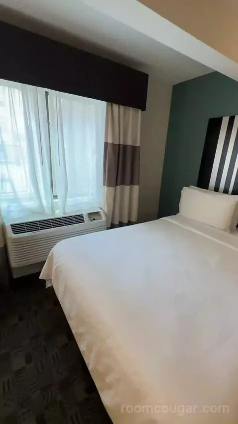 Queen Room with Two Queen Beds (#116) bed picture #9