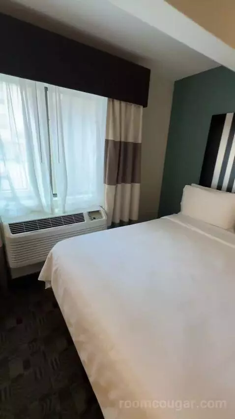 Queen Room with Two Queen Beds (#116) bed picture #10