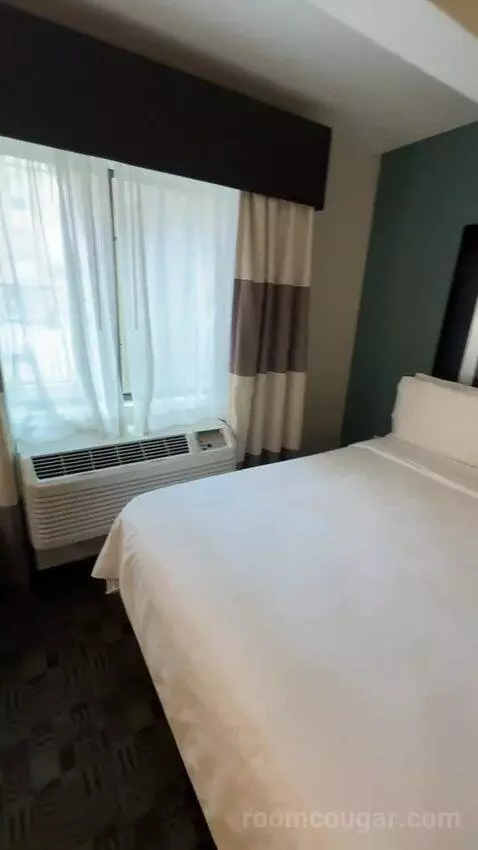 Queen Room with Two Queen Beds (#116) bed picture #11