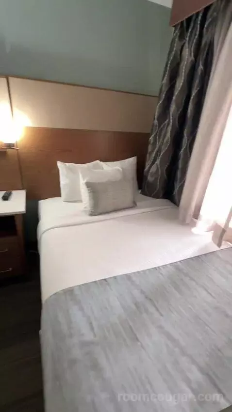 One-Bedroom Suite with Two Double Beds (#101) bed picture #11